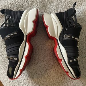 Christian Louboutin red bottom spike sneakers